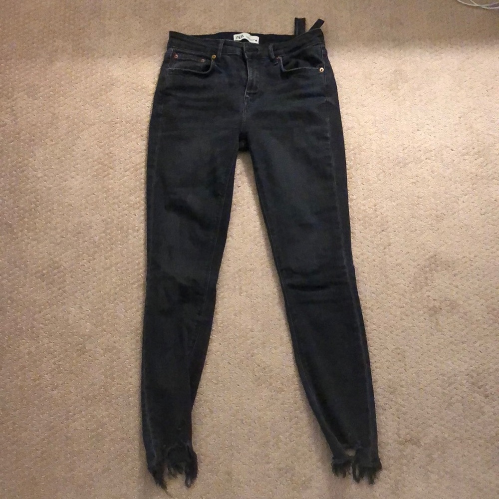 Worn looking black skinny pants